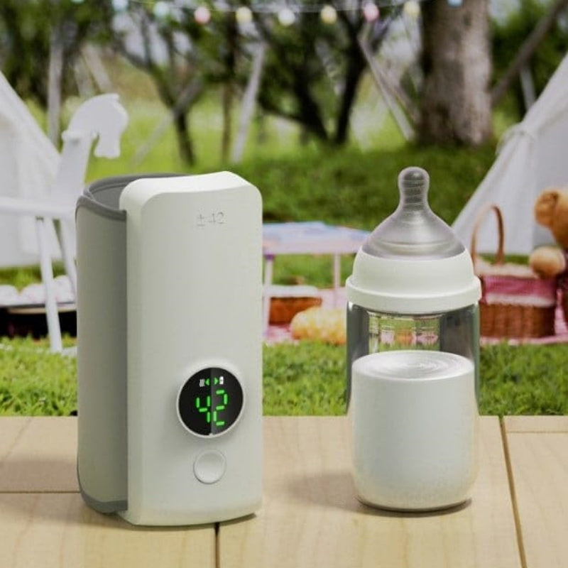 Wireless baby bottle warmer wrapped around bottle showing temperature display
